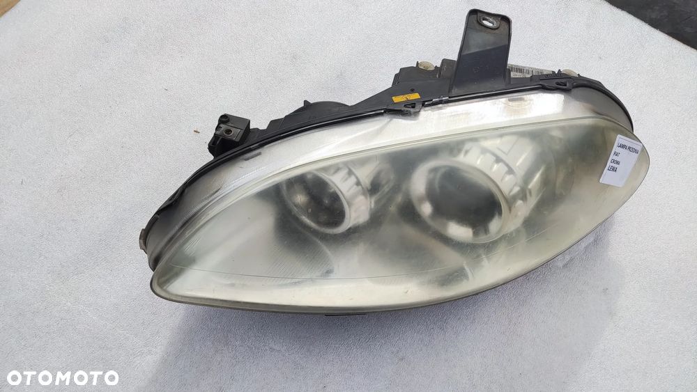 LAMPA LEWA REFLEKTOR LEWY FIAT CROMA 2 II XENON - 1