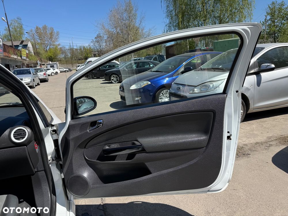 Opel Corsa 1.4 16V Cosmo - 7