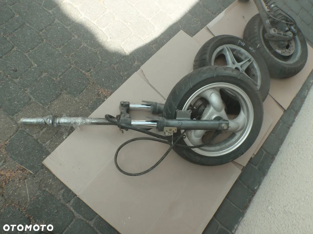 amortyzator amor laga przód zacisk przewód hamulcowy Kymco Agility 07r koło12 - 12
