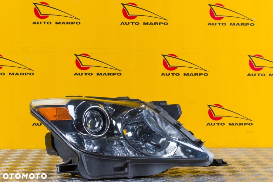 LEXUS LX LX570 2008- REFLEKTOR LAMPA ZWYKŁA SOCZEWKOWA R USA - 2