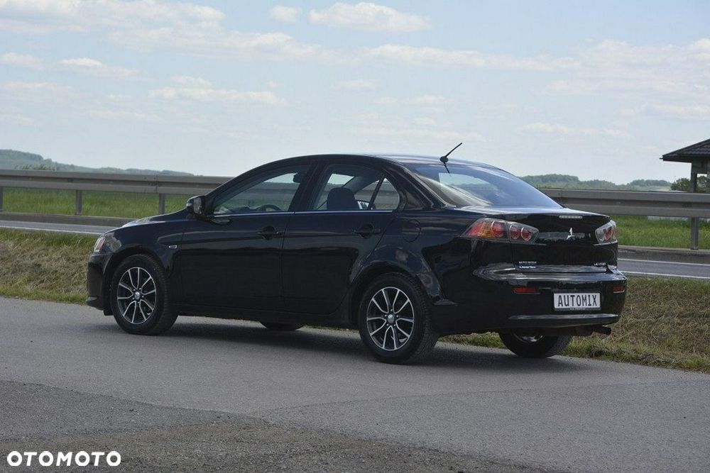 Mitsubishi Lancer 1.6 - 5