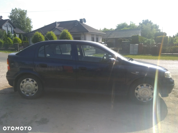 Opel Astra 1.6 drzwi prawe przednie granat metalic