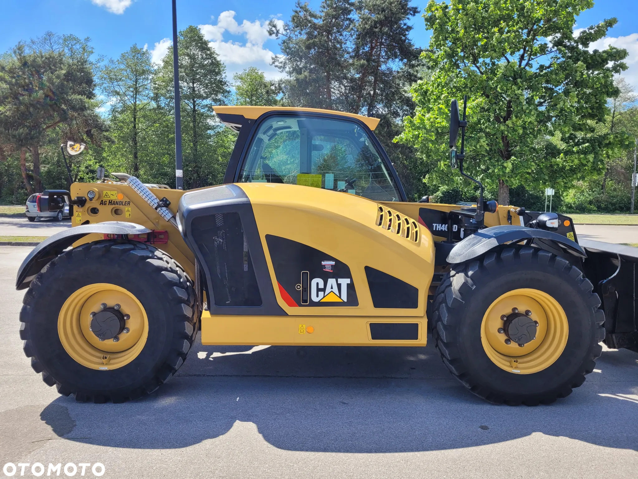 Caterpillar TH408D - 8