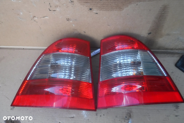 Mercedes ML W163 lift lampa tyl lewa prawa ciemna