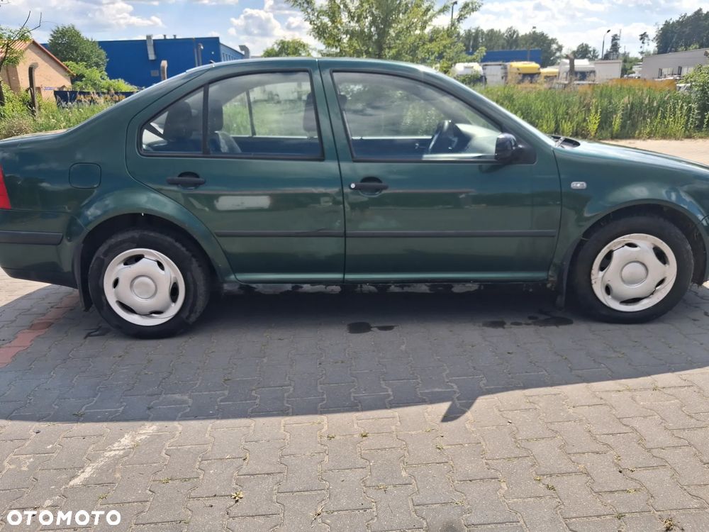 Volkswagen Bora Golf IV 4silnik 1.4 16v 55 Kw 75 KM skrzynia biegów DUU DLP DUW DUS drzwi maska zderzak klapa LC6M lampa grill atrapa lusterko panel sterownik moduł przewód wąż wiązka lewarek maglownica cewka kolektor tłumik wydech alternator rozrusznik fotel kierownica sterownik stacyjka belka sanki mcperson zwrotnica zacisk hamulcowy serwo pompa abs paliwa schowek szyba zamek czujnik sonda sprężarka klimatyzacji zbiorniczek podszybie wahacz zwrotnica NA CZĘŚCI - 5