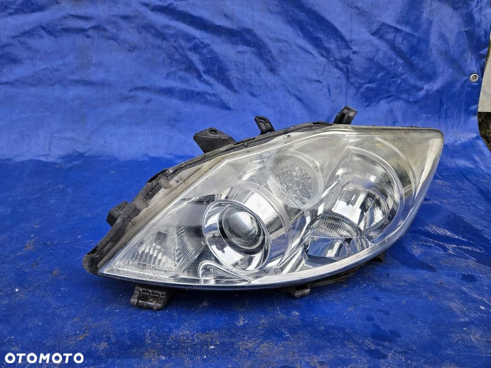 Toyota AURIS I lift 09-11 lampa lewa przednia przód - 2