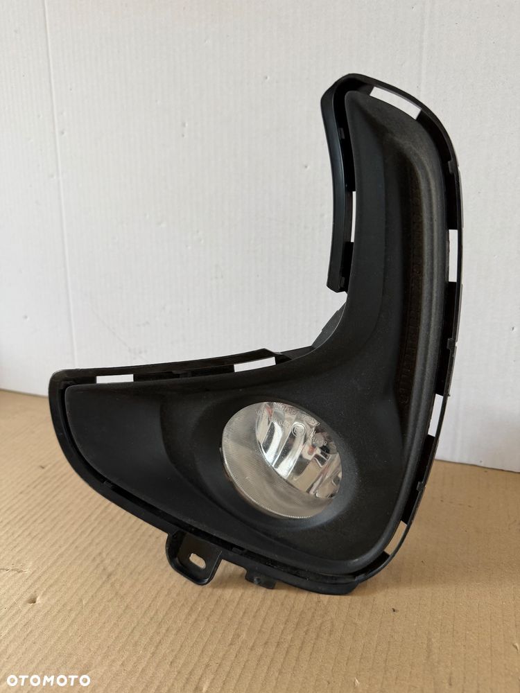 Lewa Oryginalna Kratka Ramka Zderzaka Przód Halogen Toyota Yaris 4 IV - 2