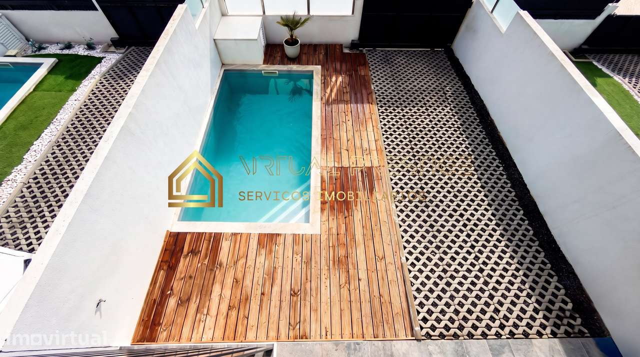 Moradia T3+1 com piscina e garagem na Caparica - Grande imagem: 2/31
