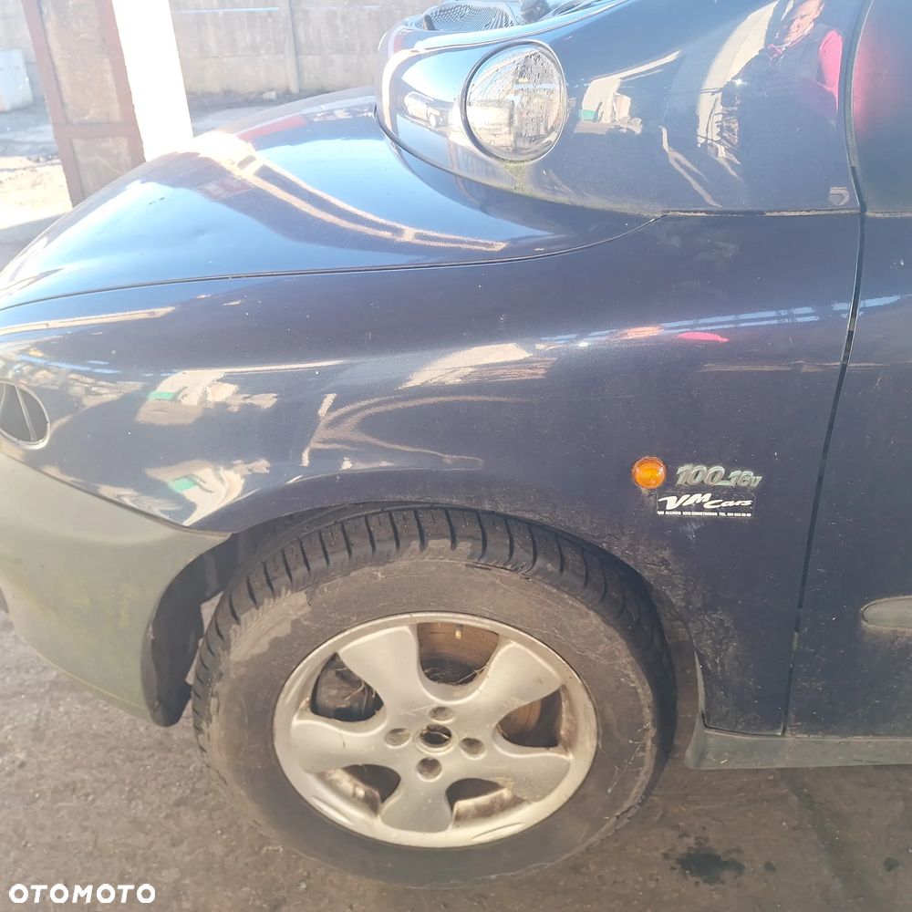 MASKA ZDERZAK DRZWI BLOTNIK LAMPY SZYBA CZESCI MULTIPLA 339/7 - 6