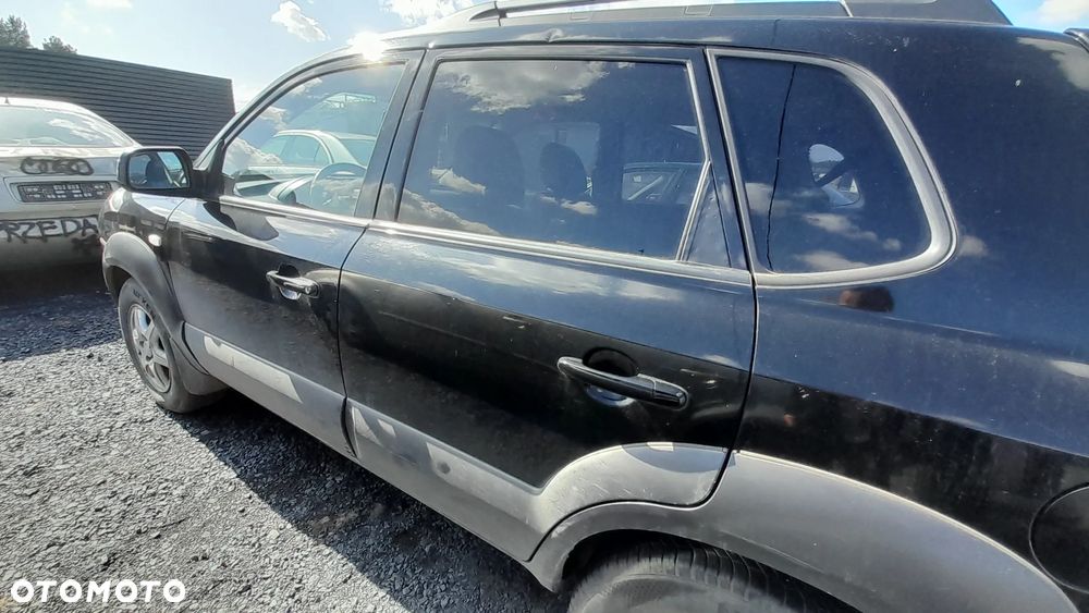 HYUNDAI TUCSON I DRZWI LEWY TYŁ TYLNE LEWE KOMPLETNE EB nr. 1/4 - 1