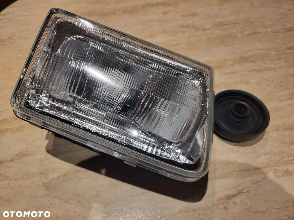 Reflektor Prawy  H4, manualny, bez silnika OPEL CORSA A 09.82-03.93 - 1