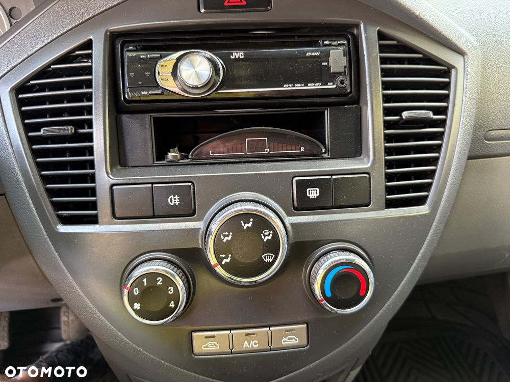 Kia Carens 1.6 / Tour - 15