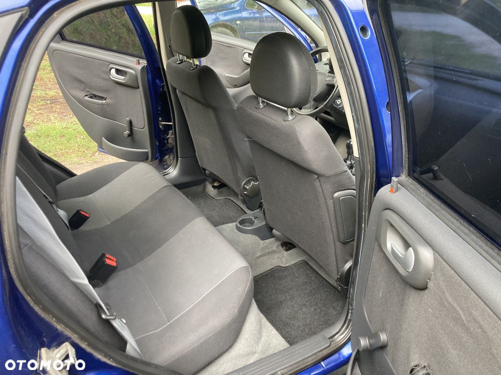 Opel Corsa 1.2 16V Cosmo - 9