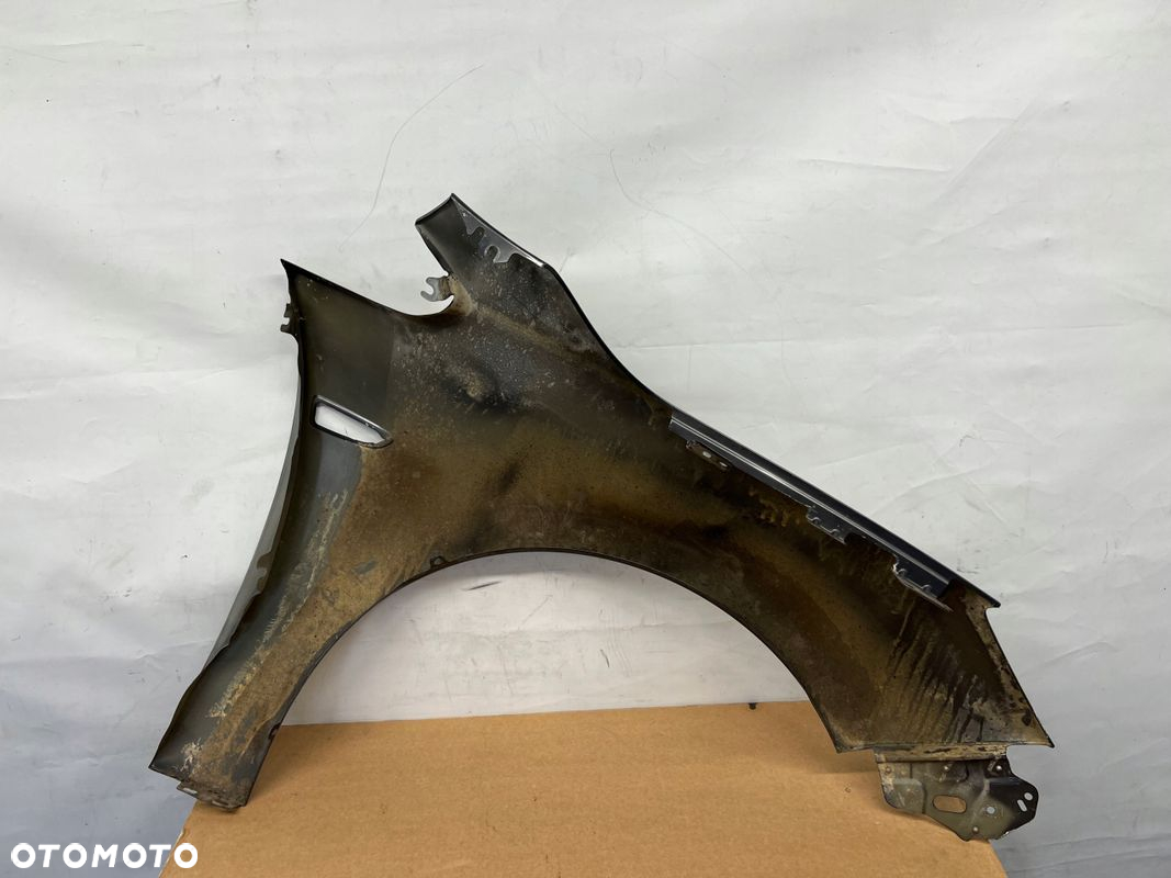 Opel Astra IV błotnik lewy przód przedni - 7