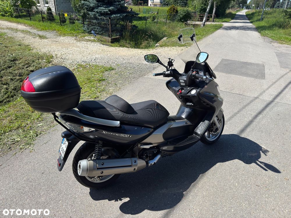Kymco Xciting - 4