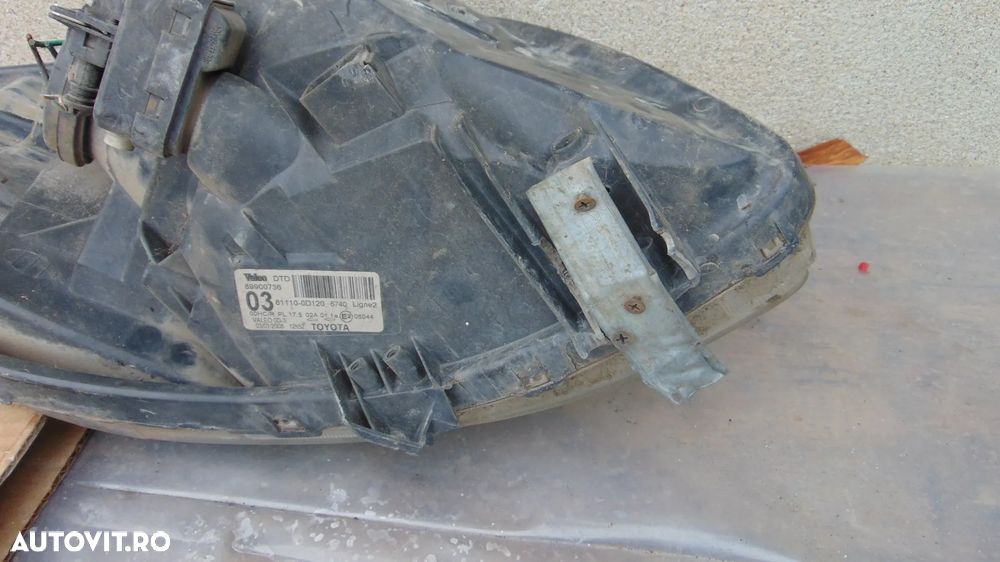 Faruri Toyota Yaris an 2006 cod 89900736 cu defect - 8