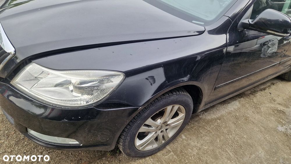 SKODA OCTAVIA II LIFT BŁOTNIK PRZÓD LEWY 9910