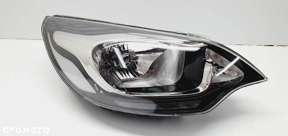 Kia Rio 3 III lampa przednia prawa EU