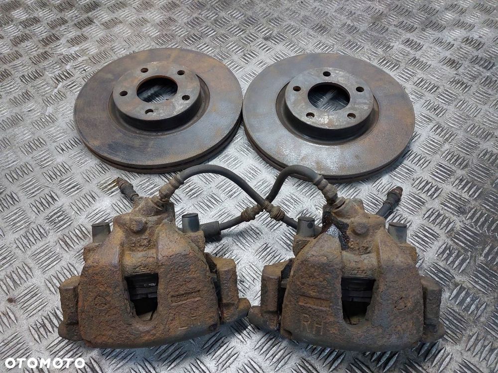 TARCZE HAMULCOWE PRZÓD + KLOCKI + ZACISKI MAZDA 5 I CR 1.8 16V - 1