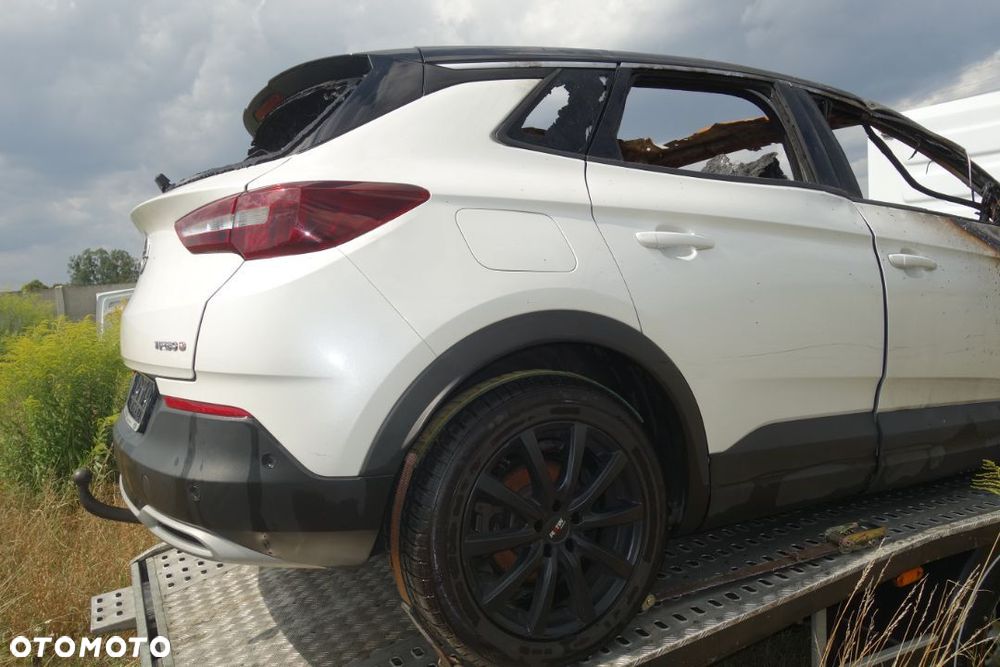 BŁOTNIK LEWY PRAWY TYŁ PAS Z WANNĄ OPEL GRANDLAND X - 7
