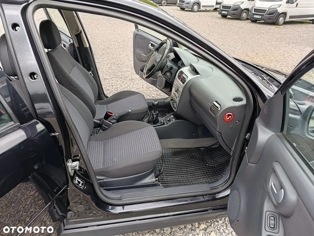Opel Corsa 1.2 16V Cosmo - 11