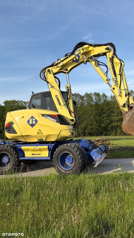 Mecalac Koparka 14 ton MECALAC 15 MWR koparko-ładowarka 3 łyżki widły 1 wł Centr.smarowanie Opony na BLIŹNIAKU 80%Camso ładowarka 714 12MTX 4x4 skrętne KLIMA kabina Premium silnik 146KM volvo EW140B DEUTZ szybka 35km/h - 15