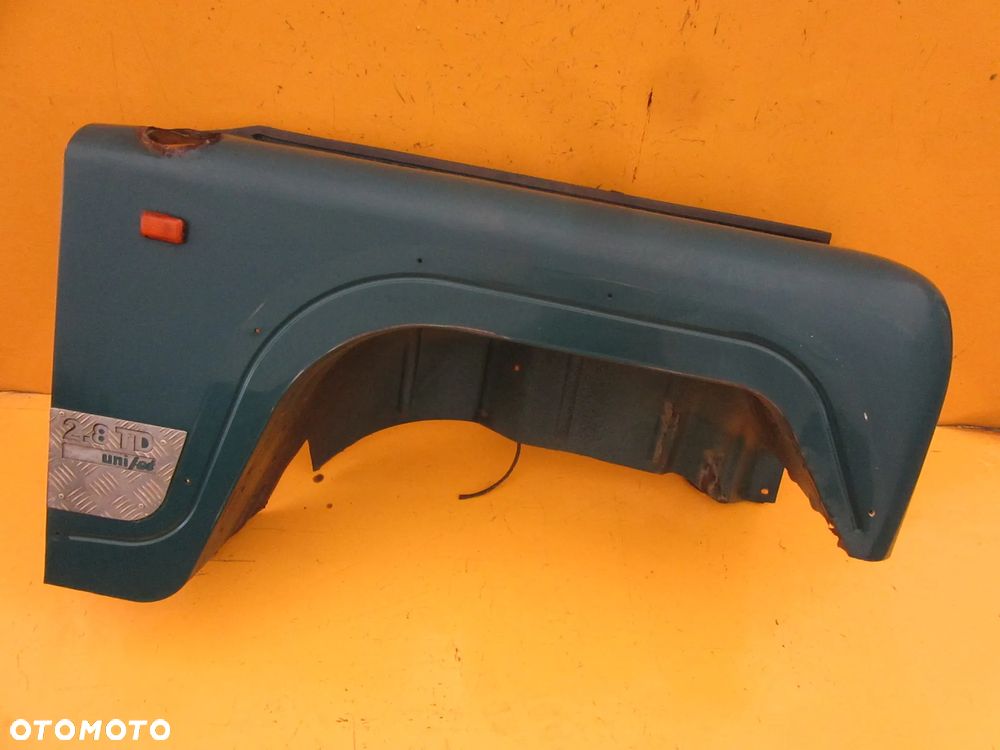 BŁOTNIK PRZÓD PRAWY Santana Anibal PS10