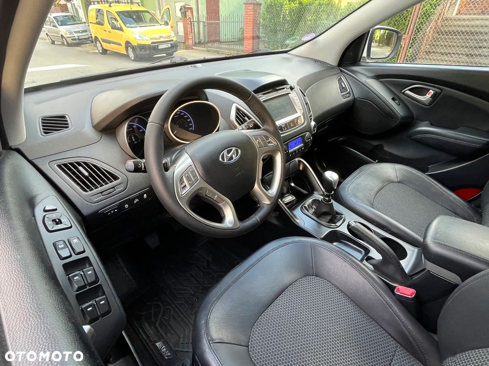 Hyundai ix35 blue 1.6 2WD Finale Gold - 13