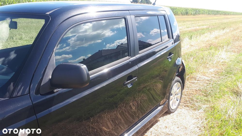Daihatsu Materia 1.5 black edition - 13