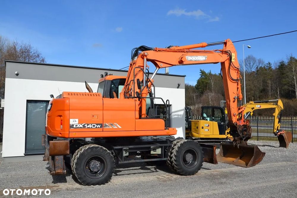 Doosan DX 140 W - 11