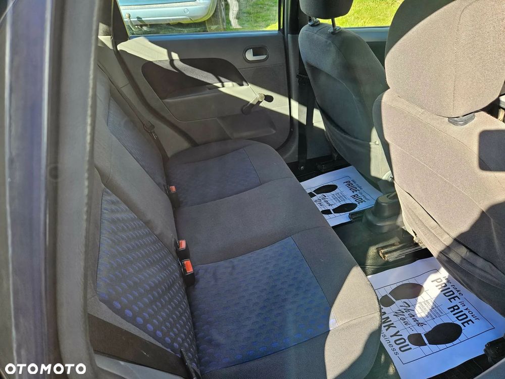 Ford Fiesta 1.4 Ghia - 10