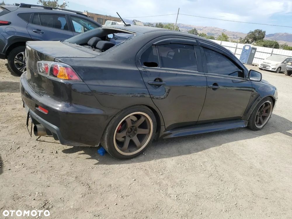 Mitsubishi Lancer Evolution GSR - 3