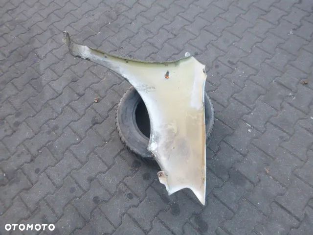 BŁOTNIK LEWY PRZÓD LEWY PRZEDNI DAEWOO KALOS KOLOR 95U - 13