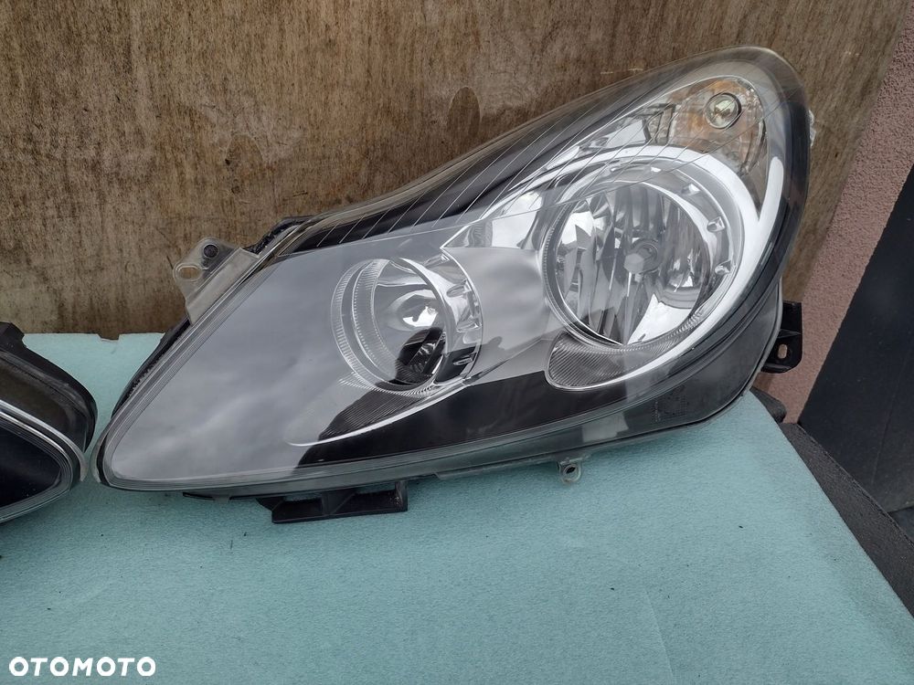 lampa corsa d przed liftem  czarna lewa eu cała - 1