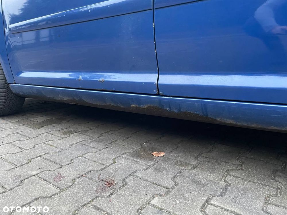 Volkswagen Touran 1.9 TDI Conceptline DSG - 13