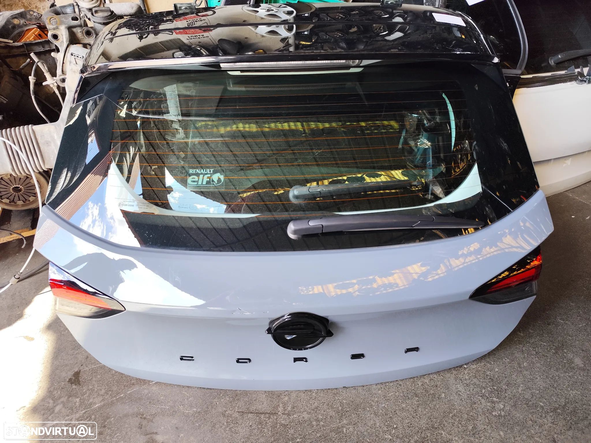 OPEL CORSA F TAMPA DA MALA - M323 - 1