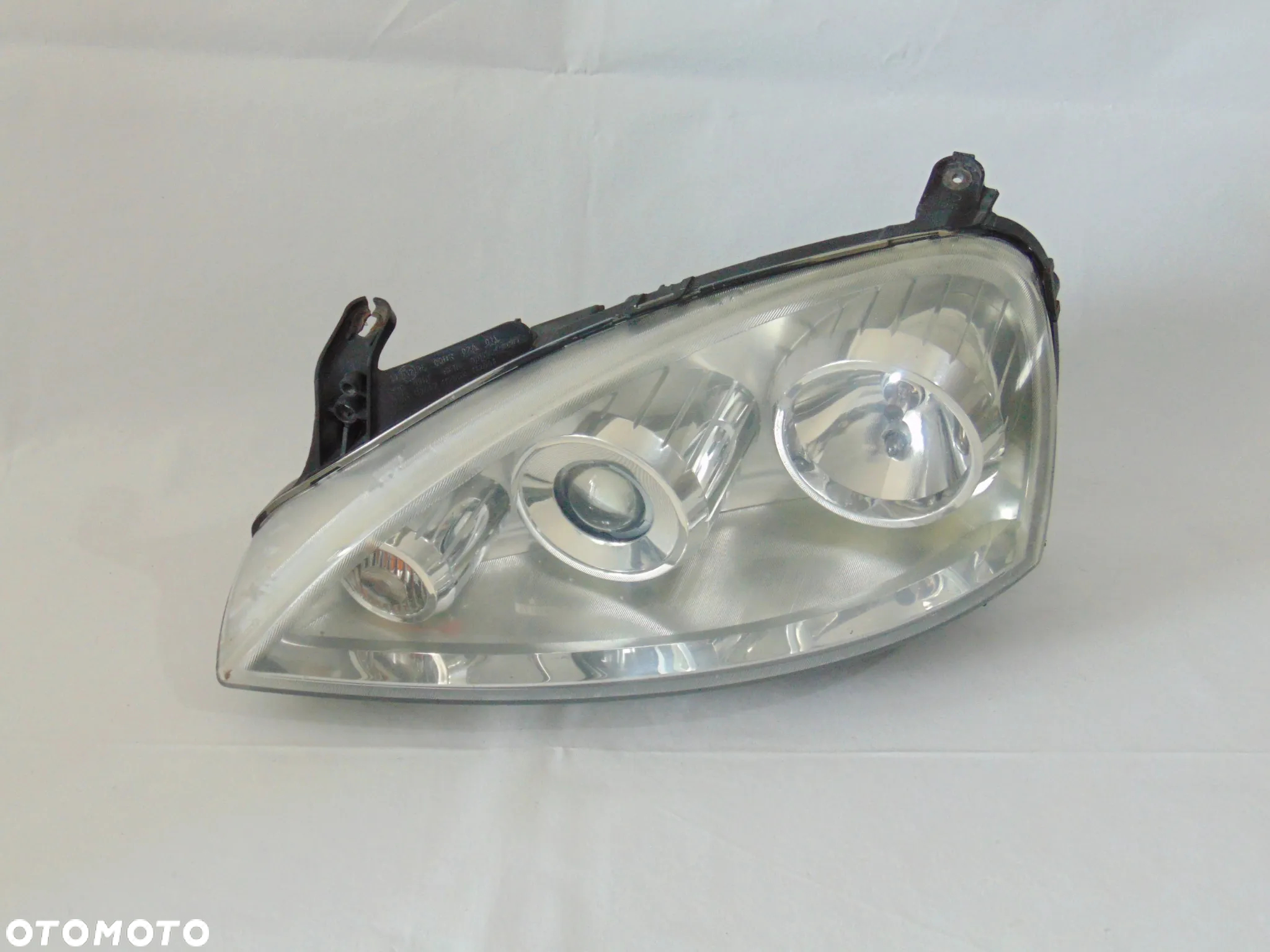 ORYGINAŁ lampa przednia przód lewa prawa soczewka Opel Corsa C FL lift 03-06r EUROPA - 2