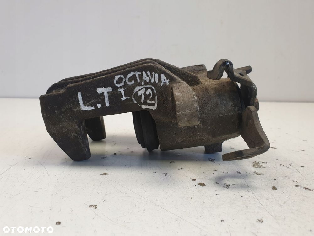 Skoda Octavia I ZACISK HAMULCOWY lewy TYŁ TYLNY - 3