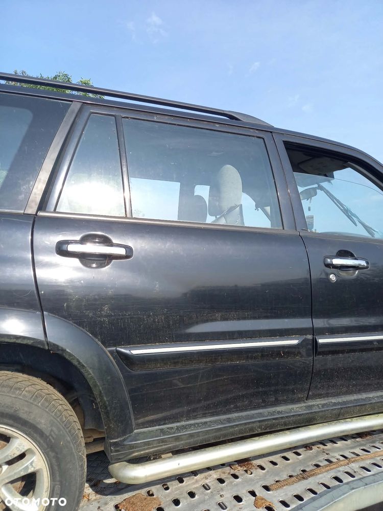 części SUZUKI GRAND VITARA XL-7 2004r 2.0 diesel 80kw DRZWI przód prawe lewe TYŁ prawe lewe ZJ3 - 2