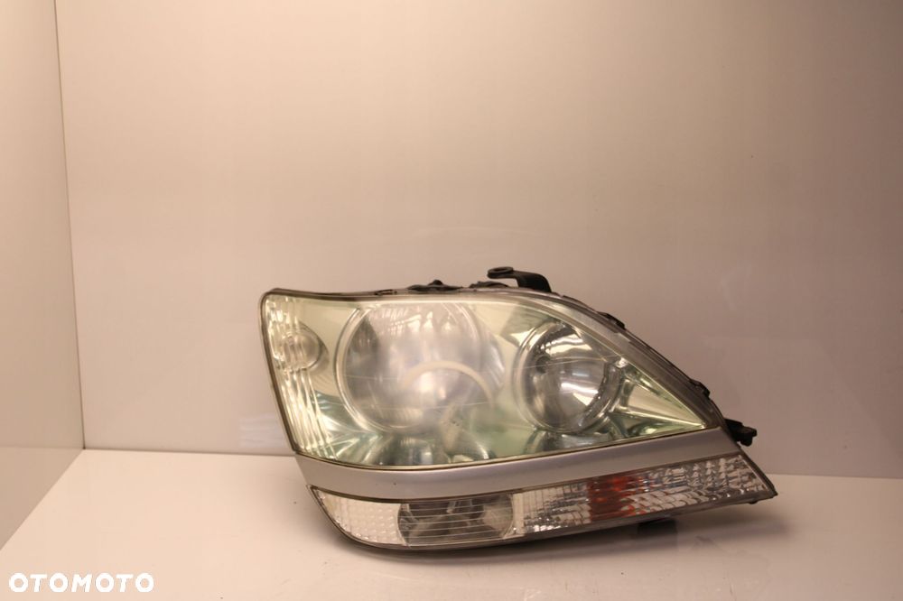 LEXUS RX II 99R- REFLEKTOR PRAWY LAMPA PRAWA PRZÓD PRZEDNIA - 1