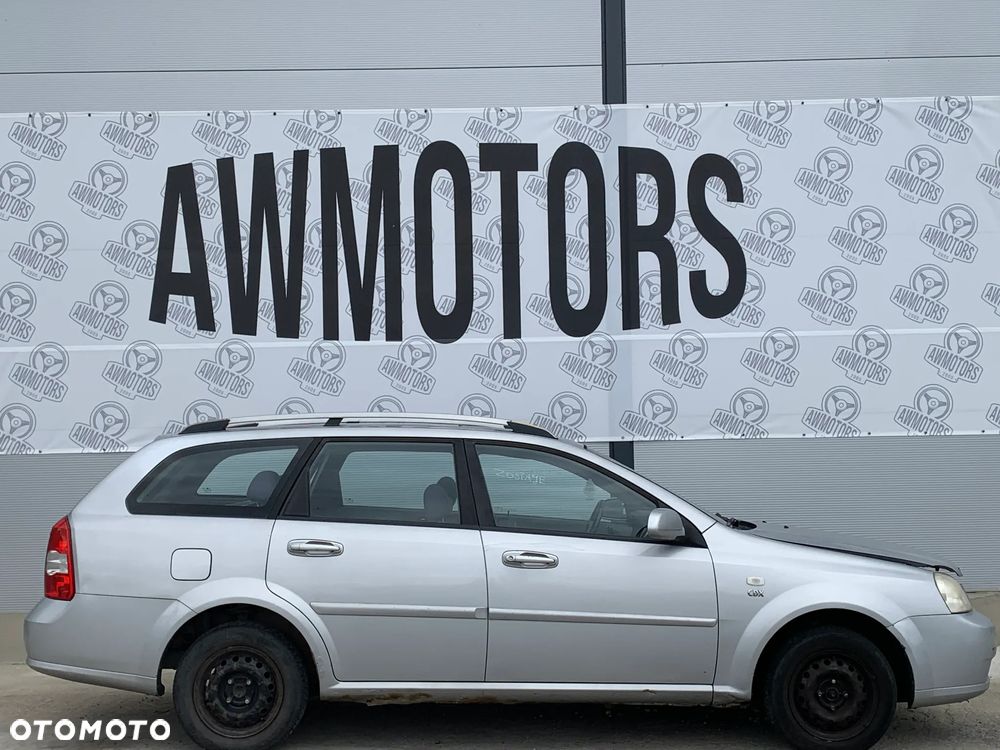 CHEVROLET NUBIRA 2006 *SAMOCHÓD NA CZĘŚCI* 1203MASKA, LAMPA, DRZWI, LUSTERKO, ZDERZAK, GRILL, BŁOTNIK, KLAPA, BELKA, DESKA, FOTELE, KANAPA, ĆWIARTKA KIEROWNICA, TARCZE, ZACISKI, ZAWIESZENIE, KOMPLETNY PRZÓD, KOMPLETNY TYŁ, LICZNIK, ZEGARY, PRAWE LEWE PRZÓD TYŁ - 1