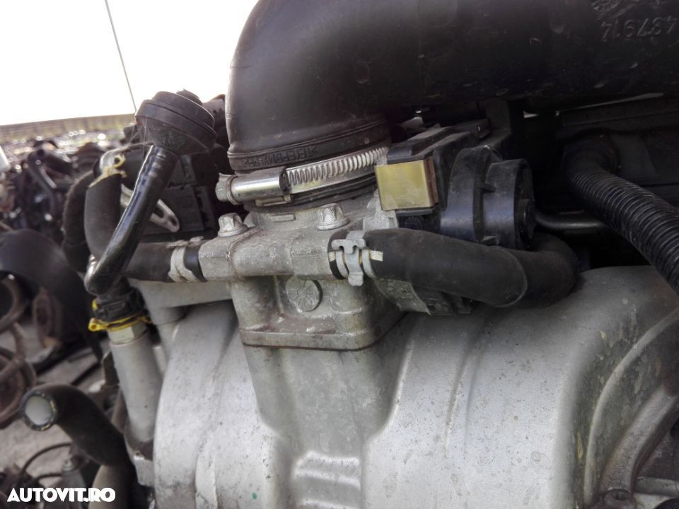 Clapeta acceleratie Opel Astra H 1.6 benzina din 2003 - 1