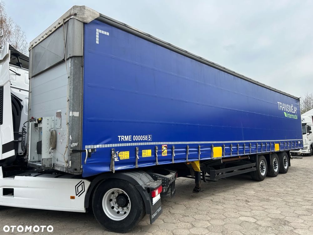 Schmitz Cargobull FIRANKA / PLANDEKI JAK NOWE / 657 841 KM PRZEBIEGU / ŁADNE OPONY / Z PEŁNYM WYPOSAŻENIEM DO ZAŁADUNKU / UCHWYTY PROMOWE / DOSTĘPNE 10 SZTUK KOLORY SREBRNY - NIEBIESKI - CZERWONY !! - 1