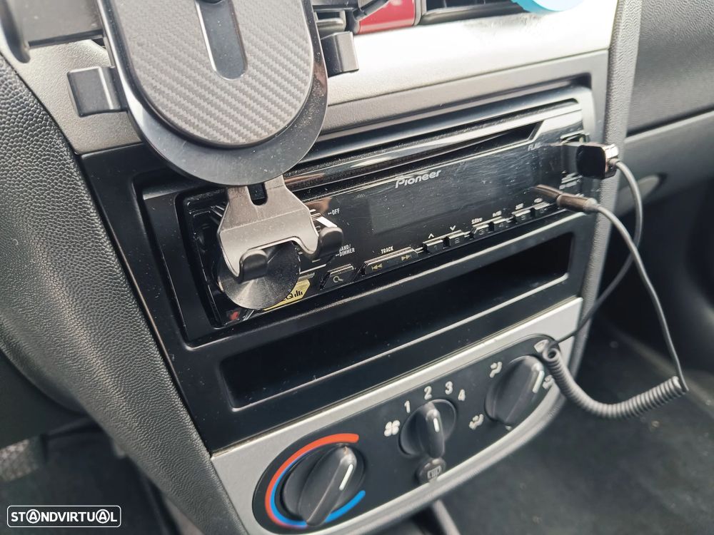 Opel Corsa 1.2 16V Enjoy - 11