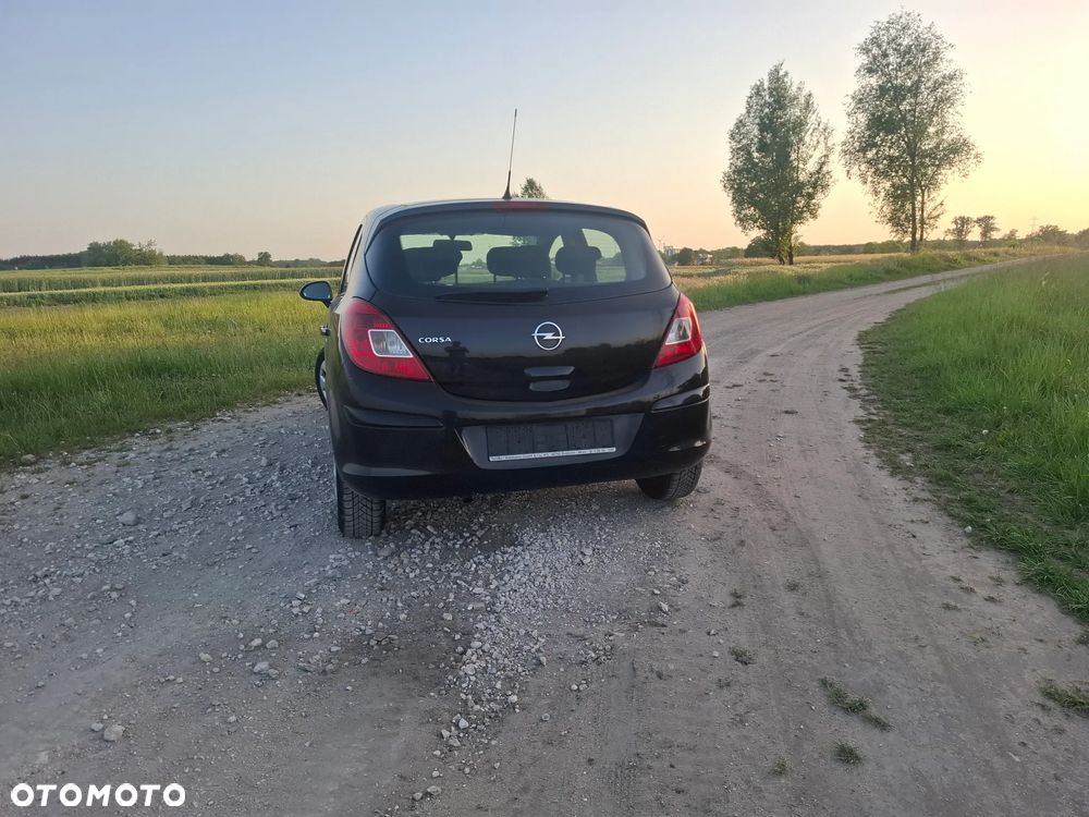 Opel Corsa 1.2 16V Enjoy - 8