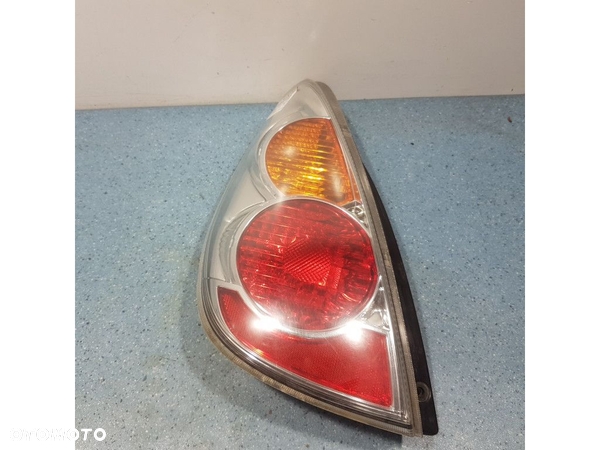 SUZUKI LIANA I LIFT KOMBI LAMPA TYŁ LEWA ZEWNĘTRZNA