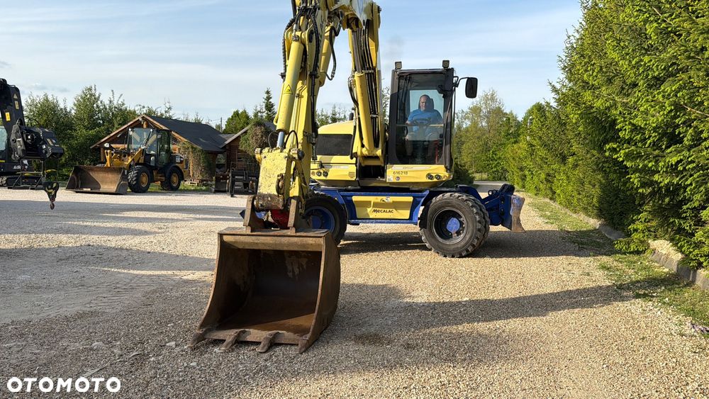 Mecalac Koparka 14 ton MECALAC 15 MWR koparko-ładowarka 3 łyżki widły 1 wł Centr.smarowanie Opony na BLIŹNIAKU 80%Camso ładowarka 714 12MTX 4x4 skrętne KLIMA kabina Premium silnik 146KM volvo EW140B DEUTZ szybka 35km/h - 12