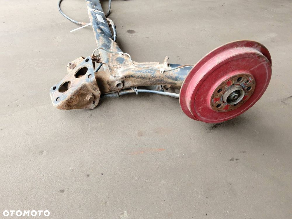 BELKA OŚ ZAWIESZENIA TYŁ BĘBNY Z ABS SKODA OCTAVIA I HB 5D - 5