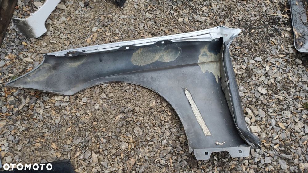 WS BŁOTNIK PRAWY PRZÓD MERCEDES CLS W219 775 - 4