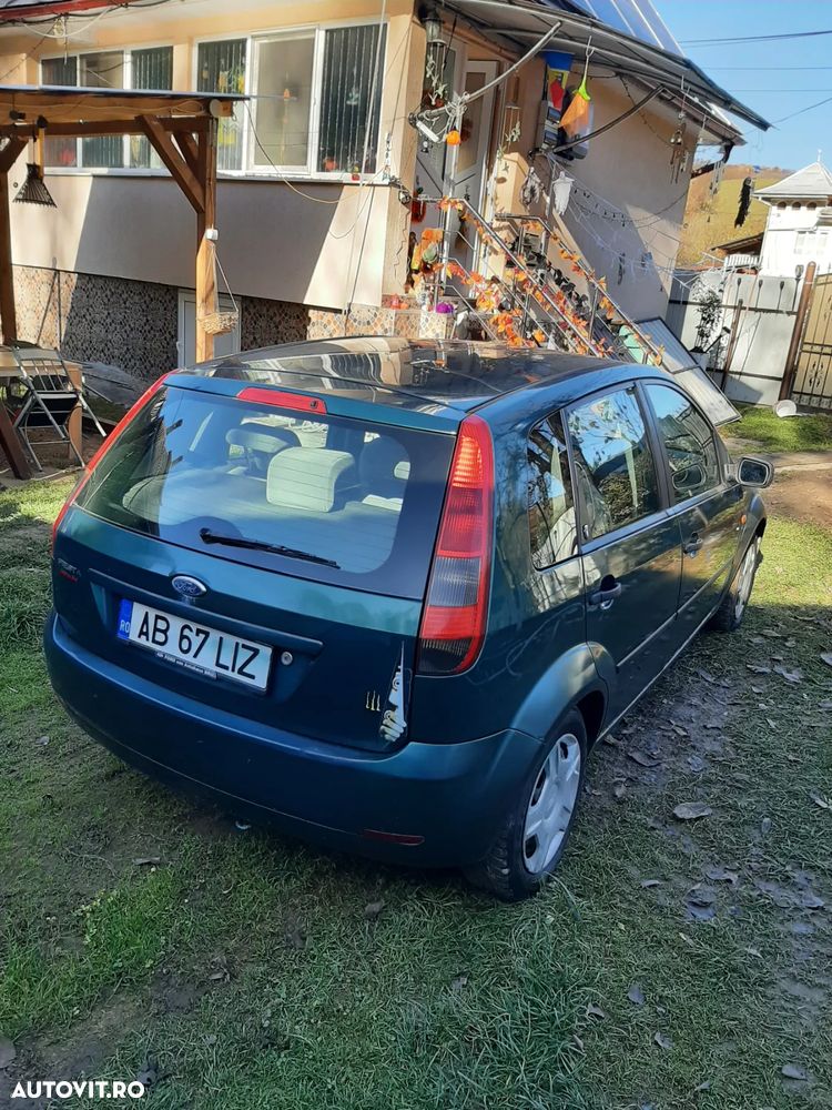 Ford Fiesta 1.4i Ghia - 6